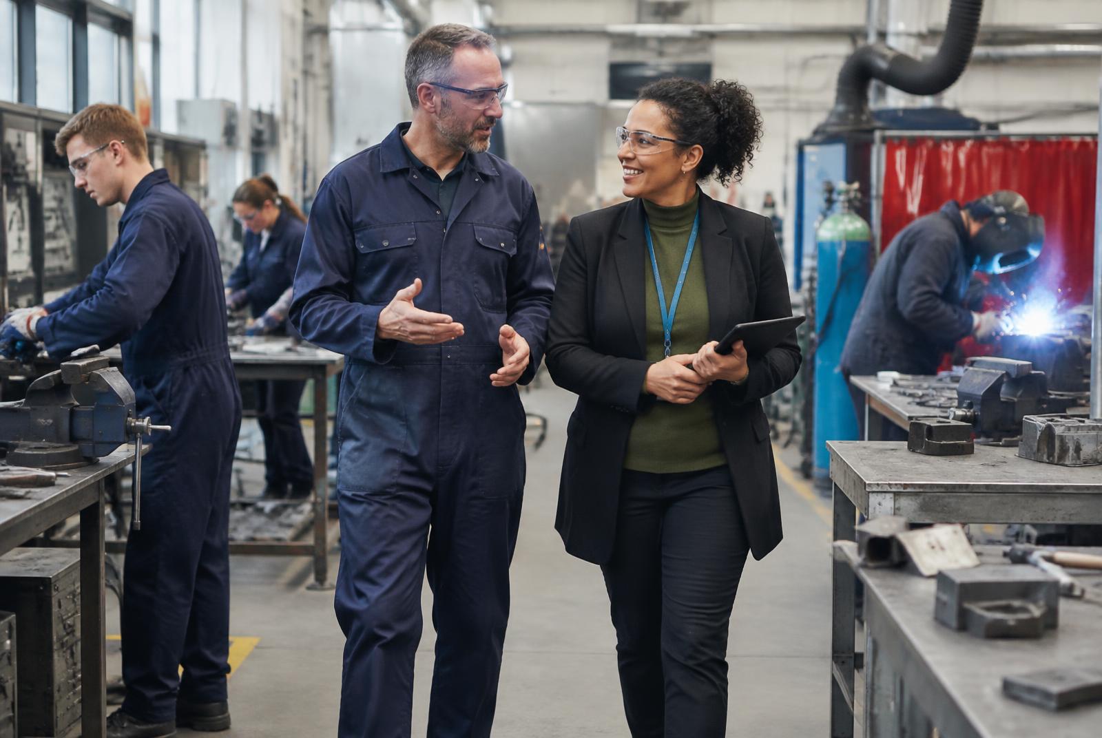 A technical lecturer and college manager in an active engineering workshop